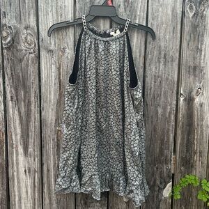 Micheal Kors women top
Size: Large